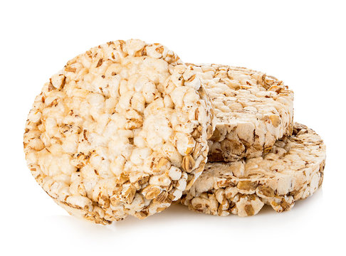 Grain crispbreads close-up isolated on a white background. Fitness concept.