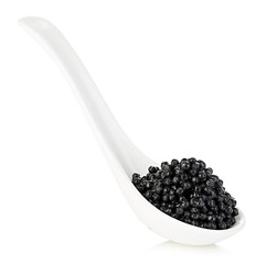 Spoon with black sturgeon caviar isolated on white background.
