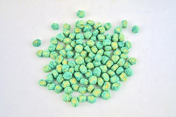 Dried pea seeds. Close-up on a white background