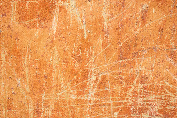 Old Distressed Scratched Chipped OchreTerracotta Rusty Background with Grungy Texture Wall. Stained...