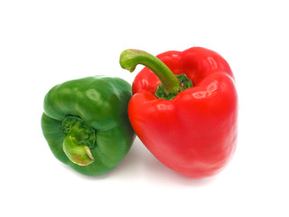 Fresh vegetables, red, green sweet peppers on white background.