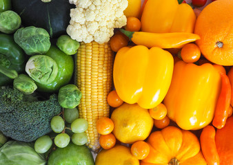 Colorful fresh fruits and vegetables background, healthy eating concept.