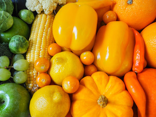 Colorful fresh fruits and vegetables background, healthy eating concept.