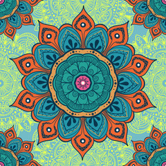 Flower mandala colorful background for cards, prints, textile and coloring books. Seamless pattern