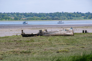 Fototapeta na wymiar Old wooden boat in Estuary