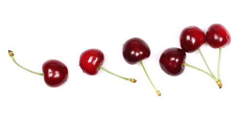 Cherries isolated on white background, top view