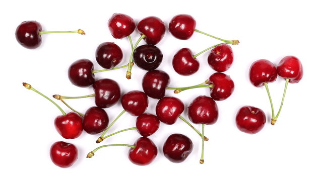 Cherries isolated on white background, top view
