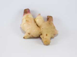 Fresh ginger on white background.