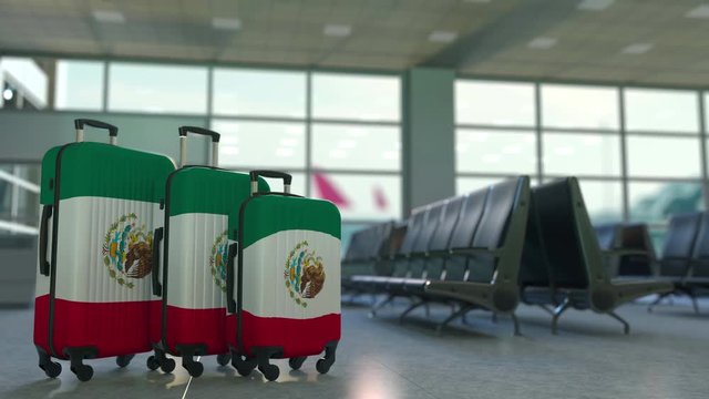 Travel suitcases featuring flag of Mexico. Mexican tourism conceptual animation