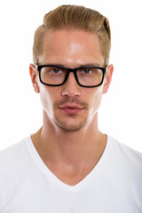 Obraz premium Face of young handsome man wearing eyeglasses