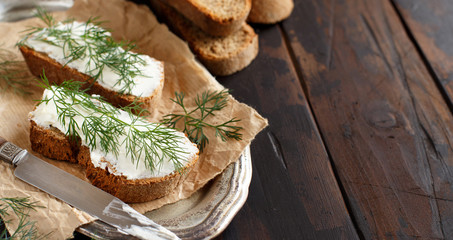 Sandwiches with cream cheese and fresh dill