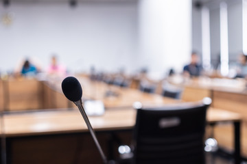 Microphone over the blurred business forum or Conference Training Learning Room Concept, Blurred background