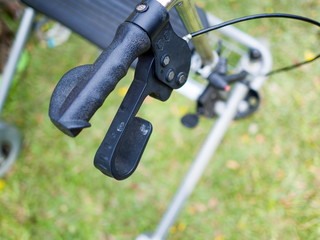 Close up handles of four wheel rollator walkers