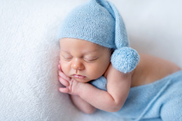 Sleeping newborn baby boy
