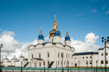 Tobolsk, Russia - July 15, 2016: Kremlin complex. Group of tourists near St Sophia-Assumption Cathedral and belltower 1587 foundation year