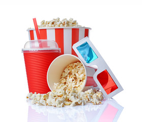 Fototapeta premium Large bucket and small cup of appetizing salty popcorn with 3d anaglyph glasses and beverage