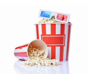 Large bucket and small cup of appetizing salty popcorn with 3d anaglyph glasses