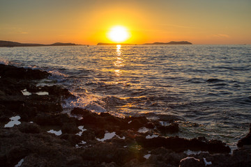 Obraz premium Sunset over sea