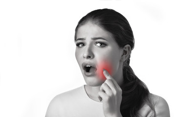  Dental care and toothache.Teeth Problem. Woman Feeling Tooth Pain. Closeup Of Beautiful Sad Girl...
