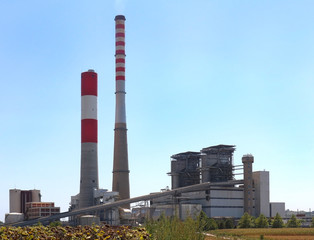 Fototapeta na wymiar Coal power plant chimneys