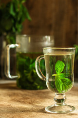 mint lemonade and fresh mint   (fresh petals of mint in the cooled drink)