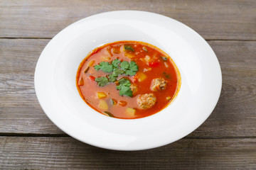 Italian national meals, minestrone soup with meat balls. Home food, restaurant cuisine, menu concept