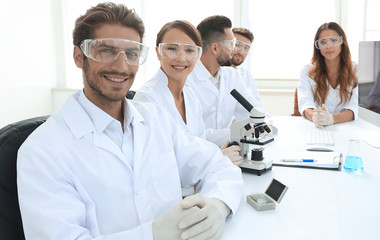 Fototapeta premium Male scientist and the team in the lab.