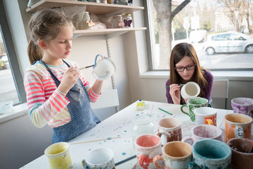 Children and their hobby pottery painting - Powered by Adobe