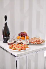 Beautiful european buffet. A lot of food for breakfast. White table. 