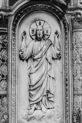Fototapeta na wymiar Ancient bas-relief of Jesus - black and white pattern