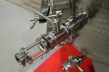 The valve on the container for storage of food liquids.