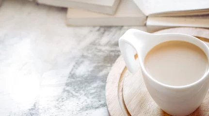  een kopje koffie met boeken © puhimec