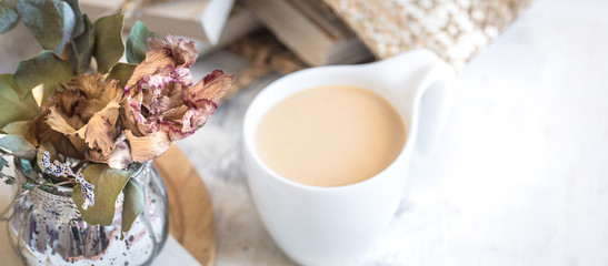 still life of a book and a cup of coffee