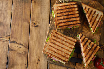 Sandwich with cucumber, cheese and ham