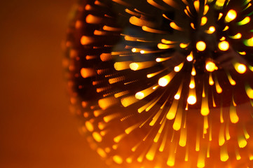 Shining light bulb with firework effect. Abstract background