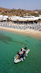 Aerial drone, bird's eye view photo of iconic and famous beach of Super Paradise with sapphire...