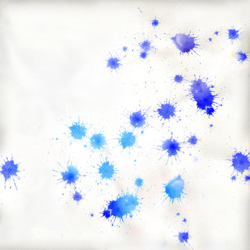 Viele verschieden blaue Farbenkleckse auf Papier