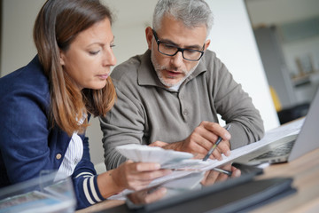 Obraz premium Designer and architect working together on project