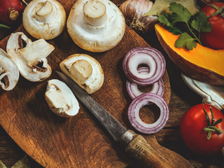 cooking. champignons. tomatoes, pumpkin. food background.
