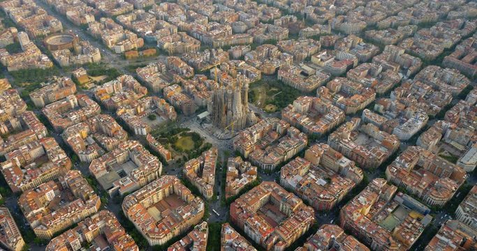 Aerial view of Barcelona Eixample district and Sagrada Familia Basilica, Spain