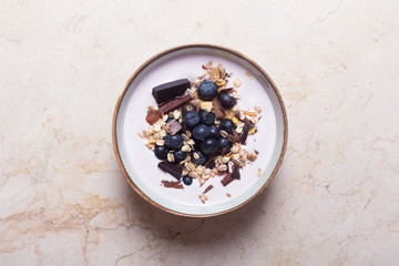 Obraz na płótnie Canvas Smoothie bowl with yogurt, fresh berries and cereal