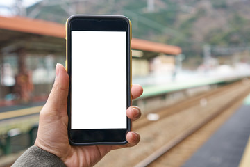 the tourist Use your smartphone to find directions, directions, location reviews. Today's smartphones can be very useful. The concept of travel, communication technology, the screen is white.