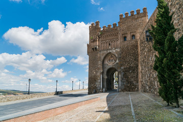 Obraz premium Puerta de Valmardón in the historic city of Toledo with nice sky in Toledo near Madrid, Spain.