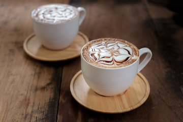 Cup of coffee on a wooden table