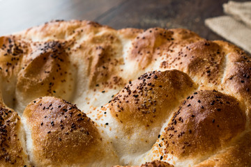 Turkish Ramadan Bread - Ramazan Pidesi on wooden surface / Pide