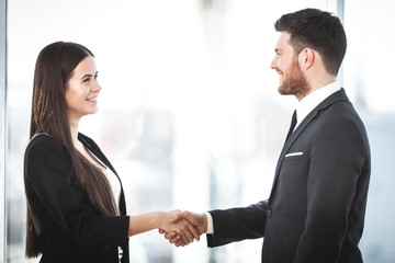 Business people shaking hands