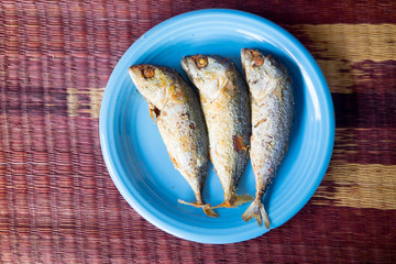 Thai mackerel fried in blue plate