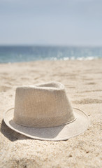 Obraz na płótnie Canvas hat on sandy beach,summer.copy spscr