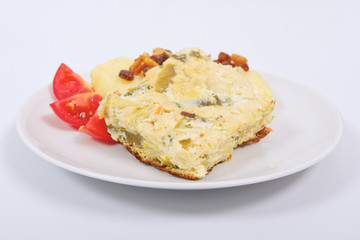 Baked leek with mashed potatoes on a white