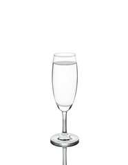 pure water pouring flowing in to wine glass isolated on white background with clipping path.